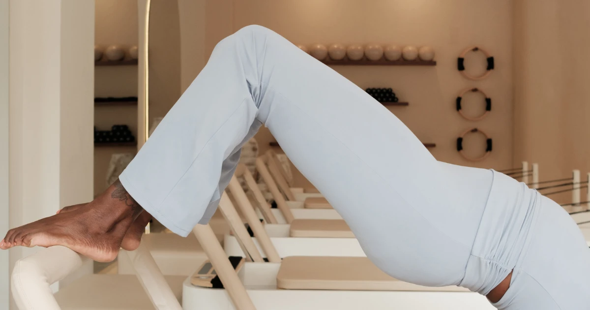 What Is Cadillac Pilates? The Trapeze Table Explained
